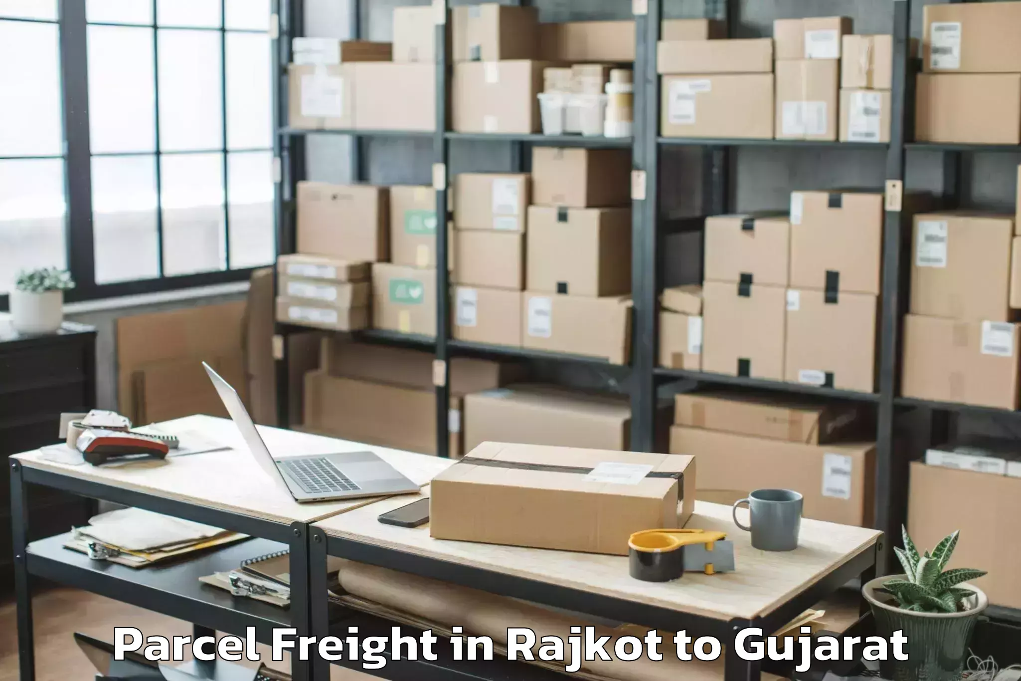 Top Rajkot to Navsari Agricultural Universit Parcel Freight Available